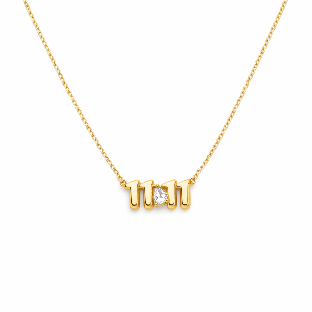 Gold necklace with a diamond pendant on a white background