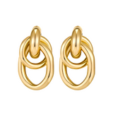 A pair of gold knot earrings with a hoop design.
