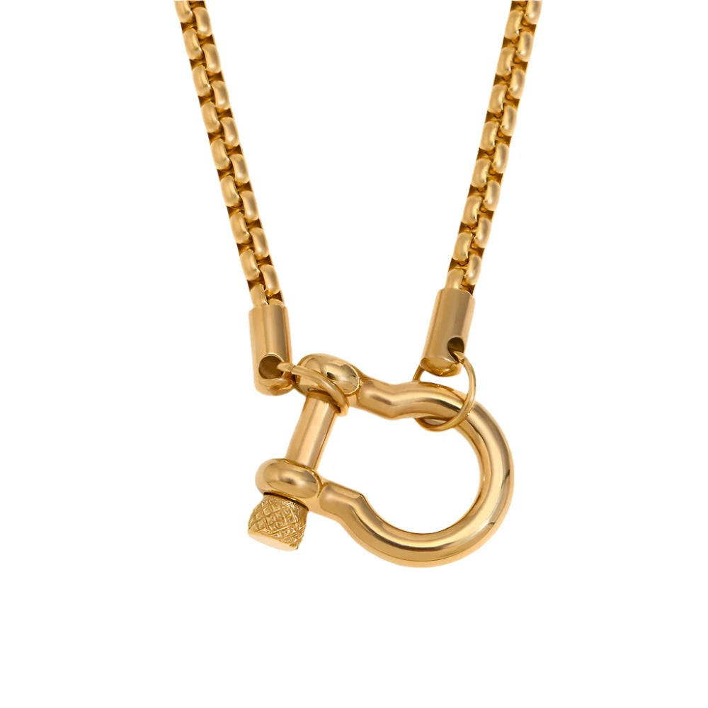 Bold minimalist chain necklace crafted from stainless steel with your choice of 18K gold or silver plating, featuring a striking contemporary shackle clasp detail. Hypoallergenic, water- and tarnish-resistant—perfect for adding modern elegance and effortless sophistication to any look.