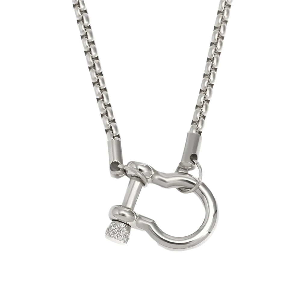 Bold minimalist chain necklace crafted from stainless steel with your choice of 18K gold or silver plating, featuring a striking contemporary shackle clasp detail. Hypoallergenic, water- and tarnish-resistant—perfect for adding modern elegance and effortless sophistication to any look.