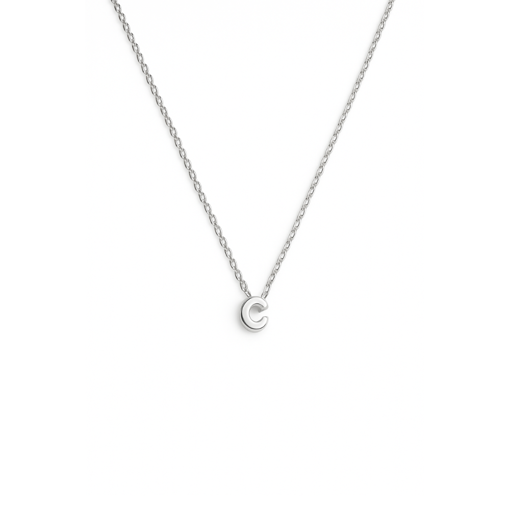 Minimalist necklace crafted from PVD-coated 18K gold-plated stainless steel for superior durability and a radiant finish. Features a custom initial pendant—perfect for adding a personal, meaningful touch to any jewellery collection. Hypoallergenic, water- and tarnish-resistant.
