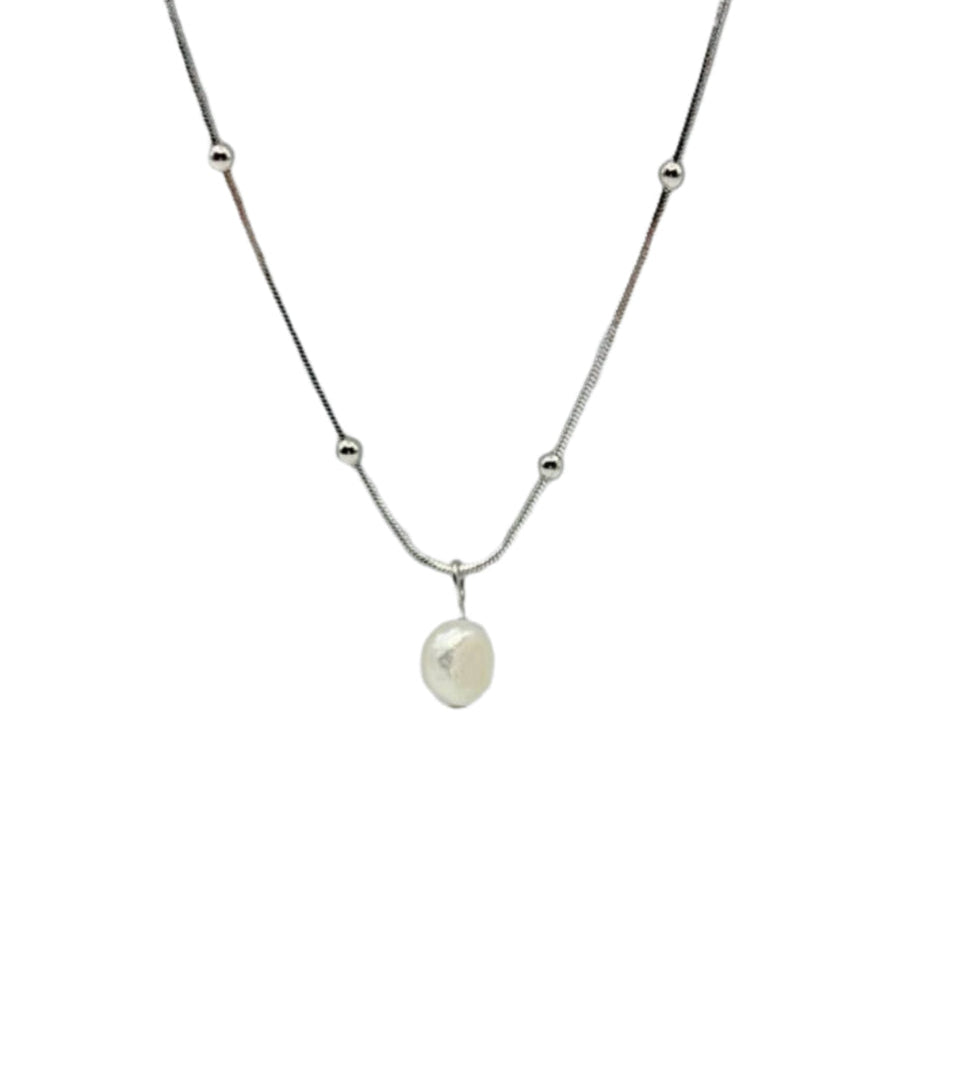 Modern classic necklace crafted from 18K gold-plated stainless steel, featuring a naturally formed freshwater baroque pearl pendant with a unique organic shape. Hypoallergenic, water- and tarnish-resistant—perfect for elevating any look with timeless elegance and natural beauty.