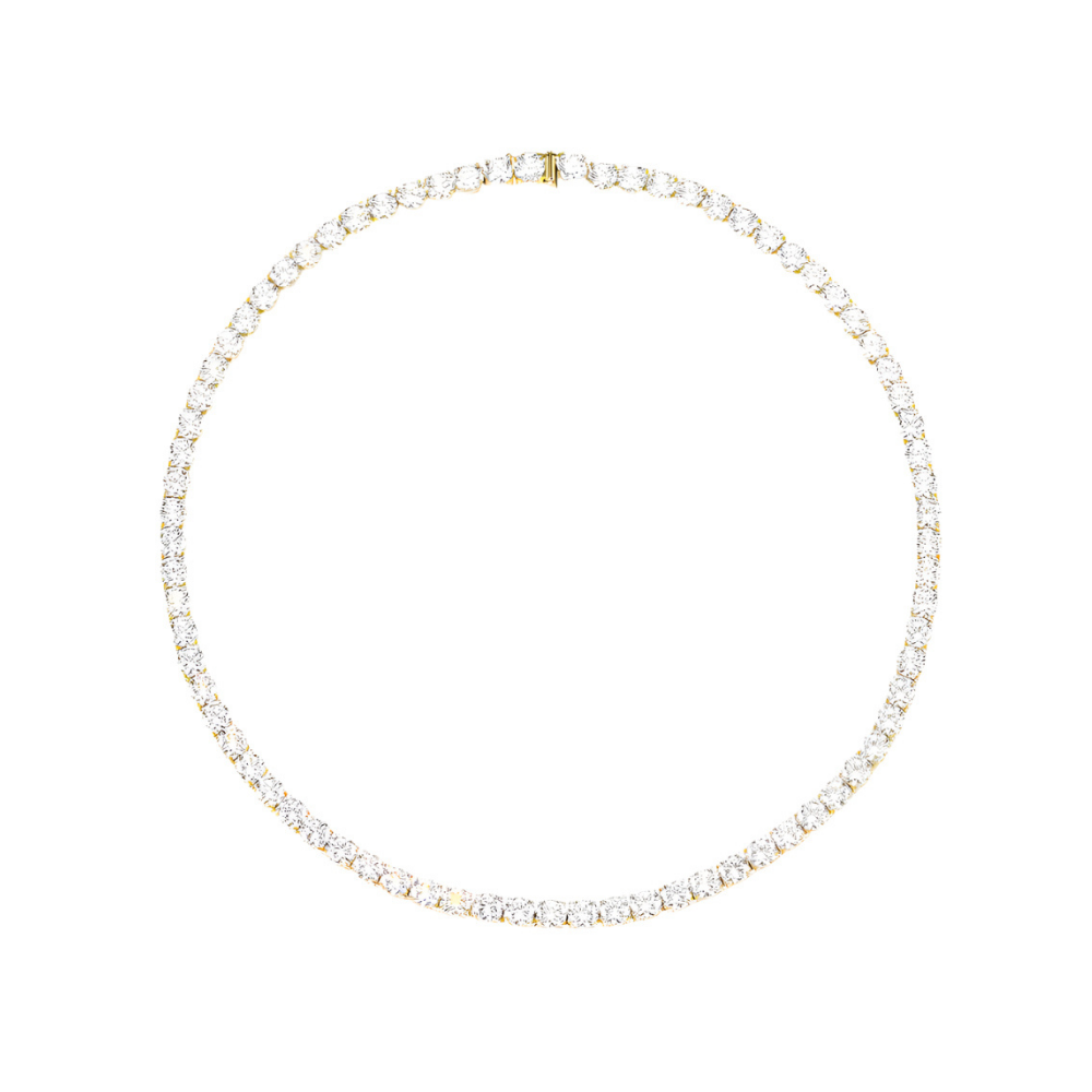 Classic tennis necklace crafted from brass with premium 18K gold plating, featuring brilliant cubic zirconia for timeless sparkle. Hypoallergenic, water- and tarnish-resistant—perfect for wearing solo or layered to add effortless sophistication to any look.