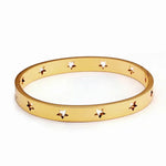Bold open cuff bracelet with a sculptural, geometric silhouette and clean, minimalist lines. Crafted from gold-plated stainless steel, this bangle-style cuff is tarnish-resistant, hypoallergenic, and water-resistant—perfect for elevating any look with effortless modern edge.