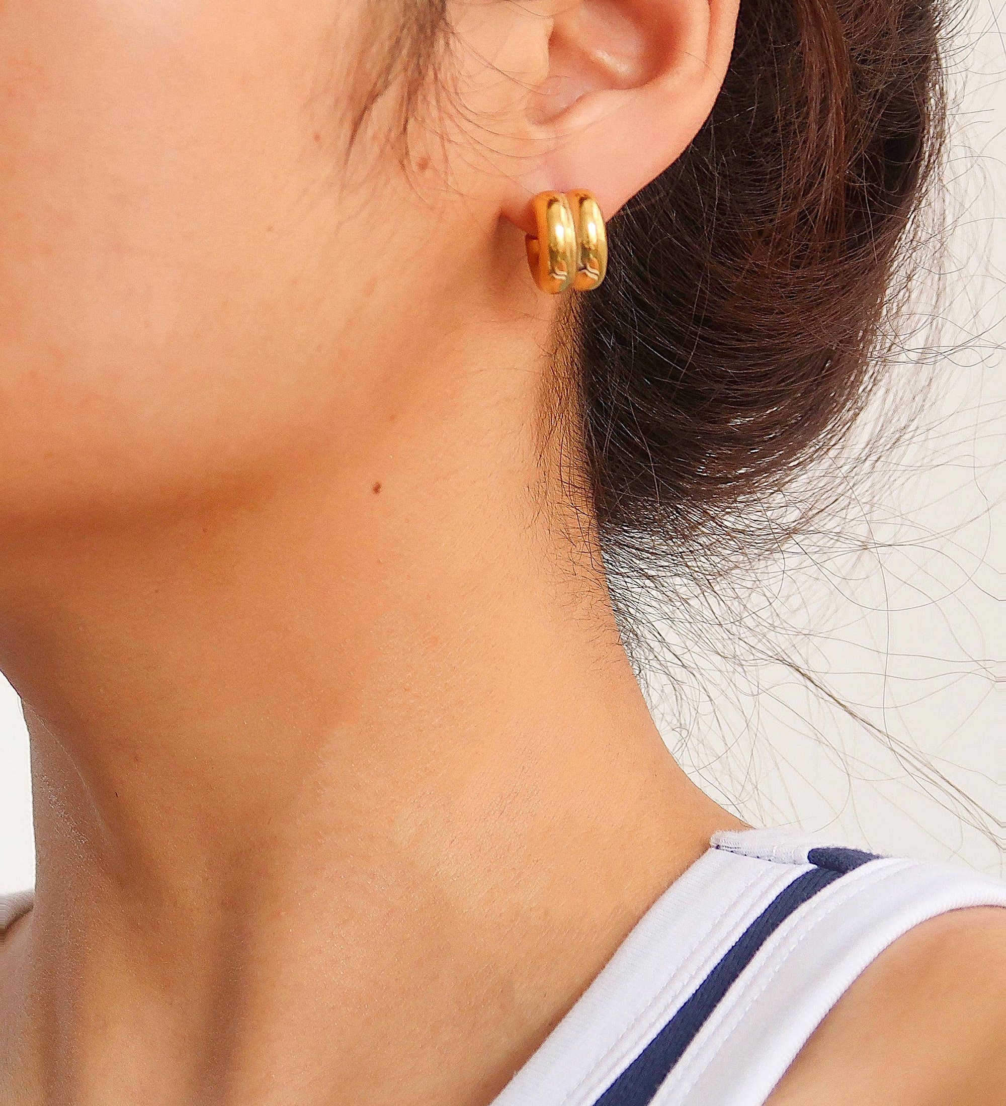 Double C-hoop earrings crafted from premium stainless steel, featuring a bold yet refined silhouette with a 0.6-inch diameter. Hypoallergenic, water- and tarnish-resistant—perfect for adding modern, versatile edge to any everyday look.
