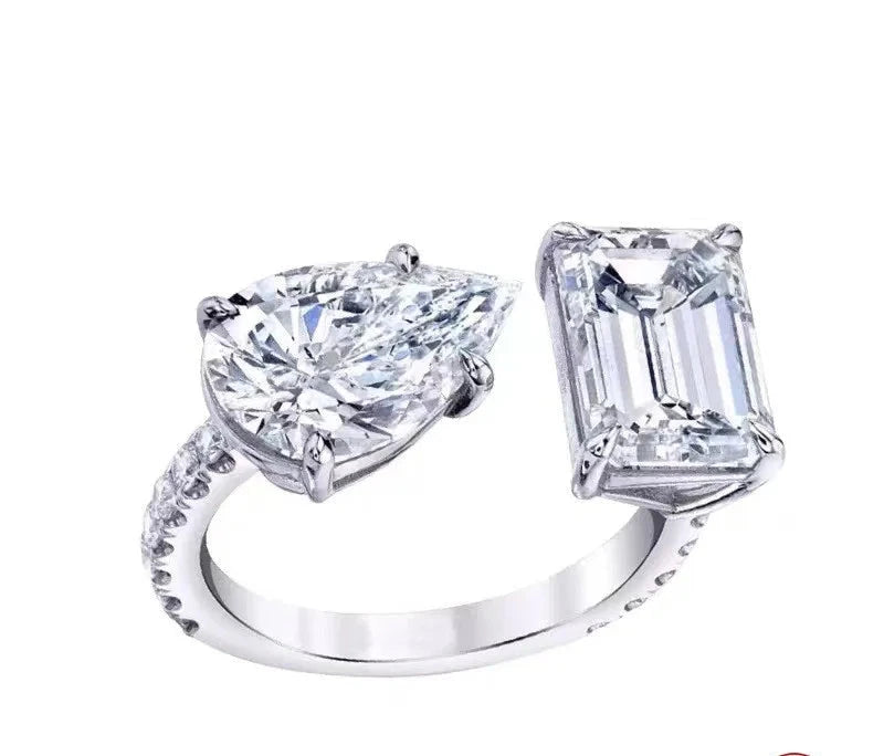 Elegant band ring crafted from certified 925 sterling silver, featuring a round-cut sapphire centre stone accented by natural side stones. Hypoallergenic, water- and tarnish-resistant—perfect for celebrating love, commitment, and timeless beauty.