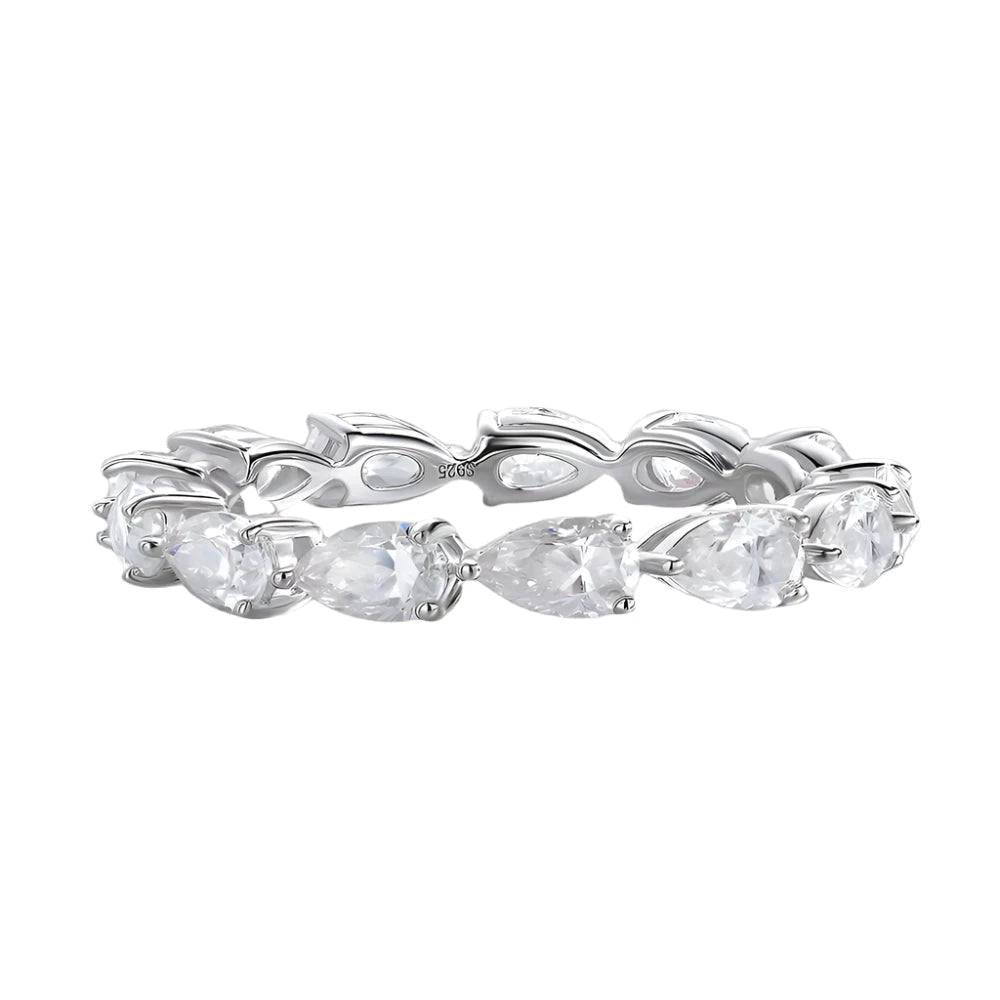 Elegant moissanite ring featuring a brilliant pear-cut centre stone set in certified 925 sterling silver. Radiates timeless elegance and modern charm—perfect as an engagement ring or a refined everyday statement. Hypoallergenic, water- and tarnish-resistant for lasting brilliance.