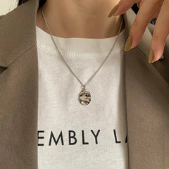 Minimal geometric pendant necklace crafted from certified 925 sterling silver, featuring a classic link chain for a refined, timeless look. Hypoallergenic, water- and tarnish-resistant—perfect for understated elegance worn solo or layered.