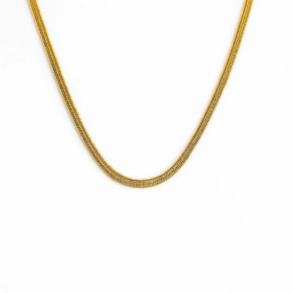 Gold chain necklace on a white background