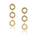 Gold hoop earrings on a white background
