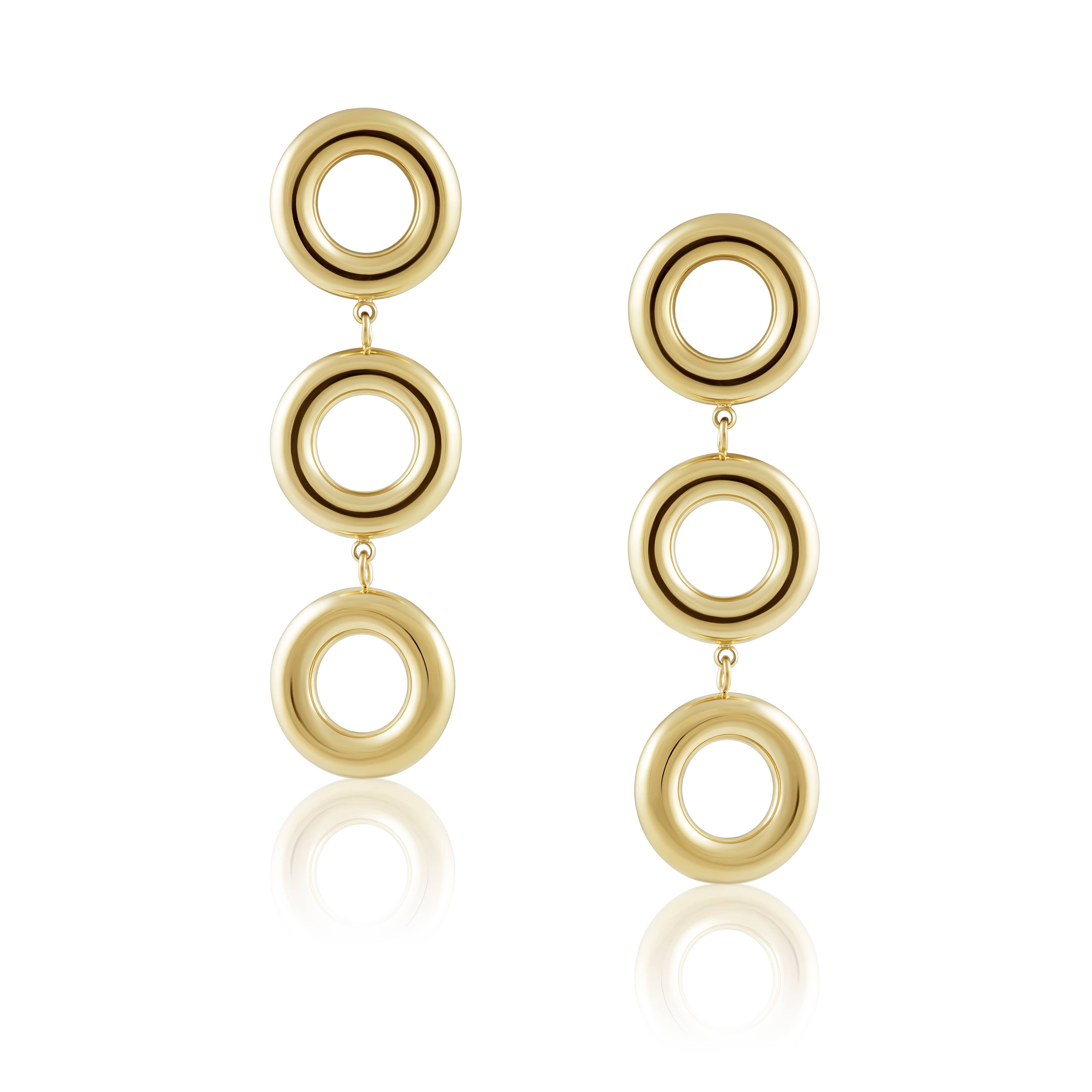 Gold hoop earrings on a white background