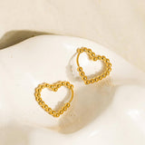Petite heart-shaped earrings crafted from 18K gold-plated stainless steel. Measuring 0.5 x 0.75 inches, these non-tarnish, hypoallergenic, lead- and nickel-free earrings are water-resistant—perfect for adding a touch of romantic charm to any look.