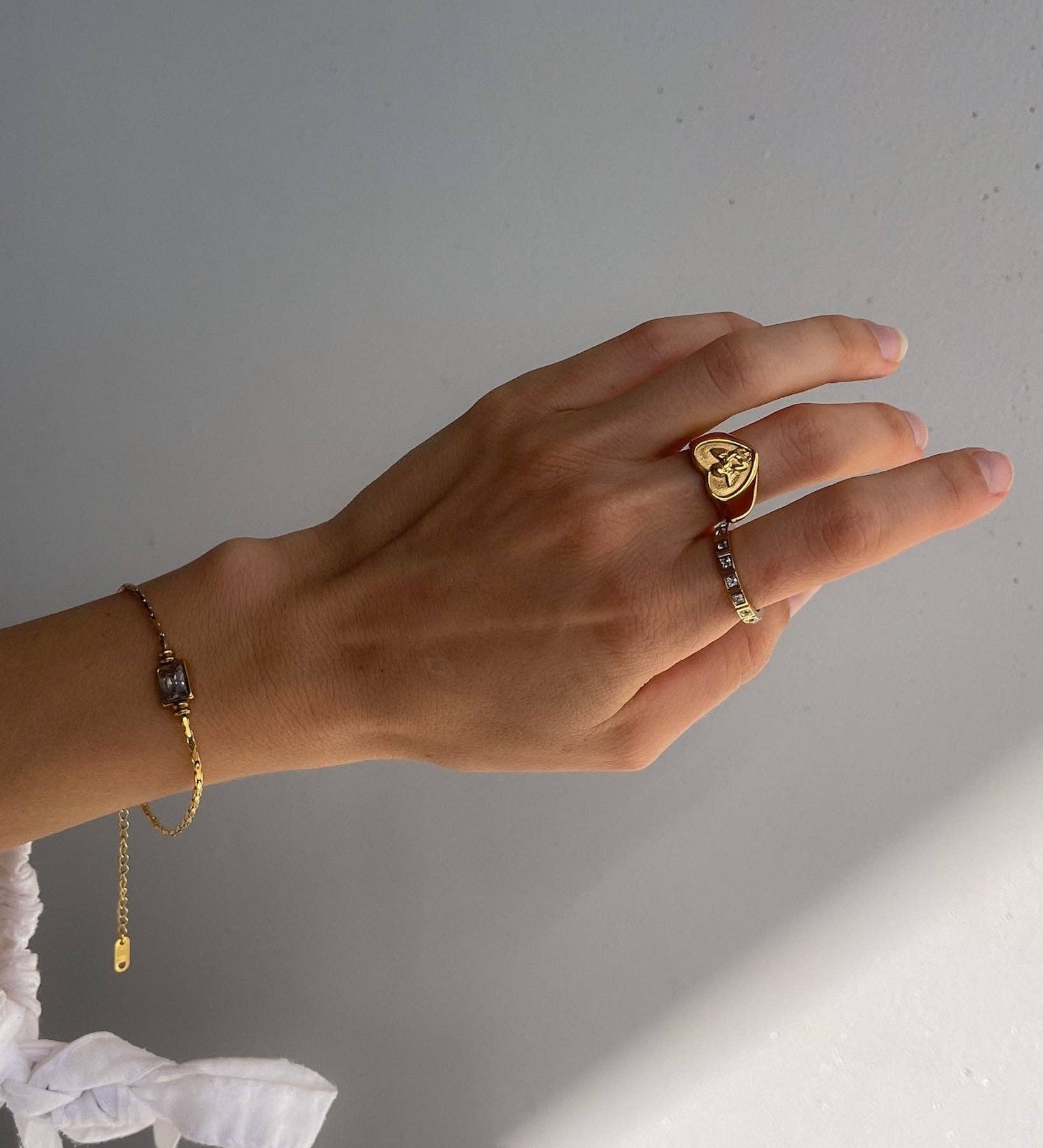 Contemporary bracelet crafted from 18K gold-plated stainless steel, featuring a square-cut zirconia pendant for modern sparkle. Hypoallergenic, tarnish-free, and water-resistant—perfect for adding refined elegance and timeless sophistication to any look.