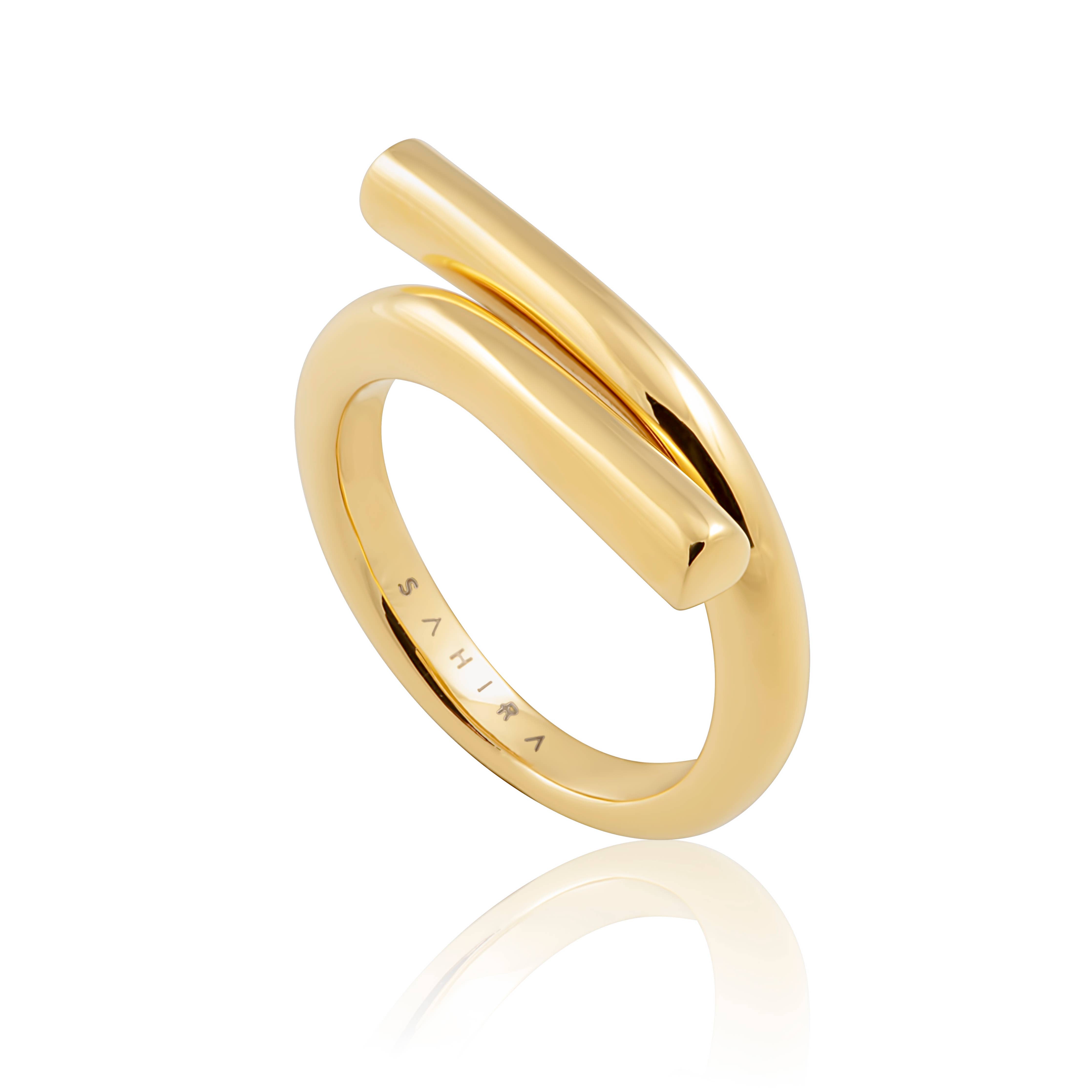 Bold and polished statement ring with a minimalist silhouette, crafted from 18K gold-plated stainless steel. US size 7. Hypoallergenic, water- and tarnish-resistant—an effortlessly powerful piece that adds refined edge to any look.