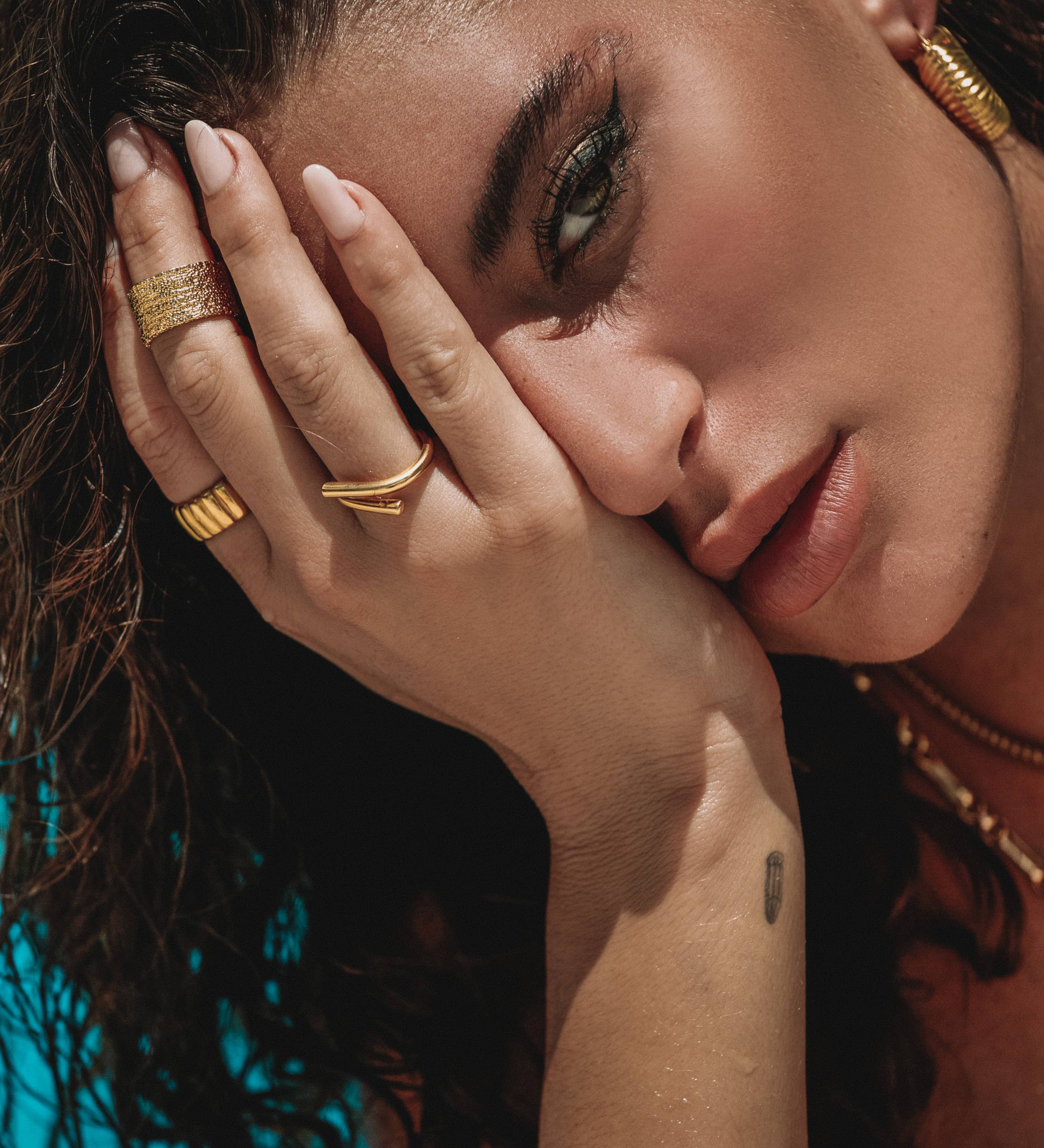Bold and polished statement ring with a minimalist silhouette, crafted from 18K gold-plated stainless steel. US size 7. Hypoallergenic, water- and tarnish-resistant—an effortlessly powerful piece that adds refined edge to any look.