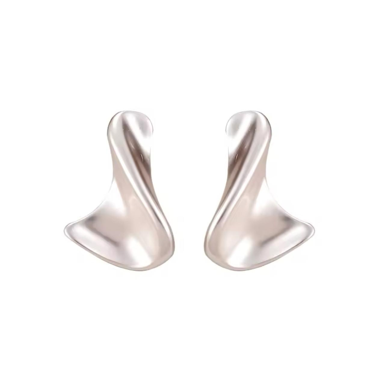 Minimalist round stud earrings crafted from a brass base with sterling silver plating. Hypoallergenic, water- and tarnish-resistant—delicate and timeless, perfect for everyday sophistication with secure backings for comfortable wear.