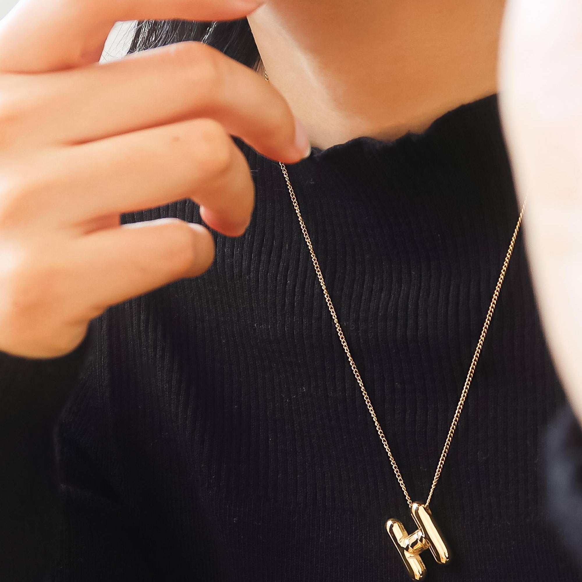 Playful necklace crafted from premium stainless steel with 18K gold plating, featuring a balloon-style alphabet letter pendant (0.8 inch). Chain length 16 inches plus 2-inch extender. Hypoallergenic, water- and tarnish-resistant—perfect for adding a personal and whimsical touch to any look