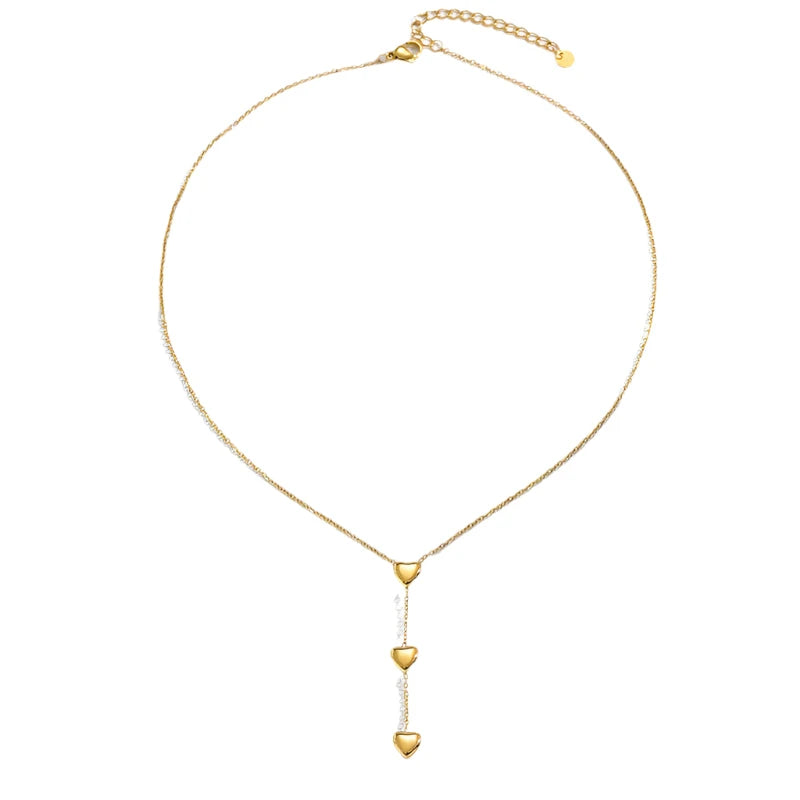 Minimalist Y-shaped ball chain necklace crafted from premium polished stainless steel, featuring a delicate heart drop pendant. Hypoallergenic, water- and tarnish-resistant—perfect for adding modern elegance and effortless charm to any outfit.