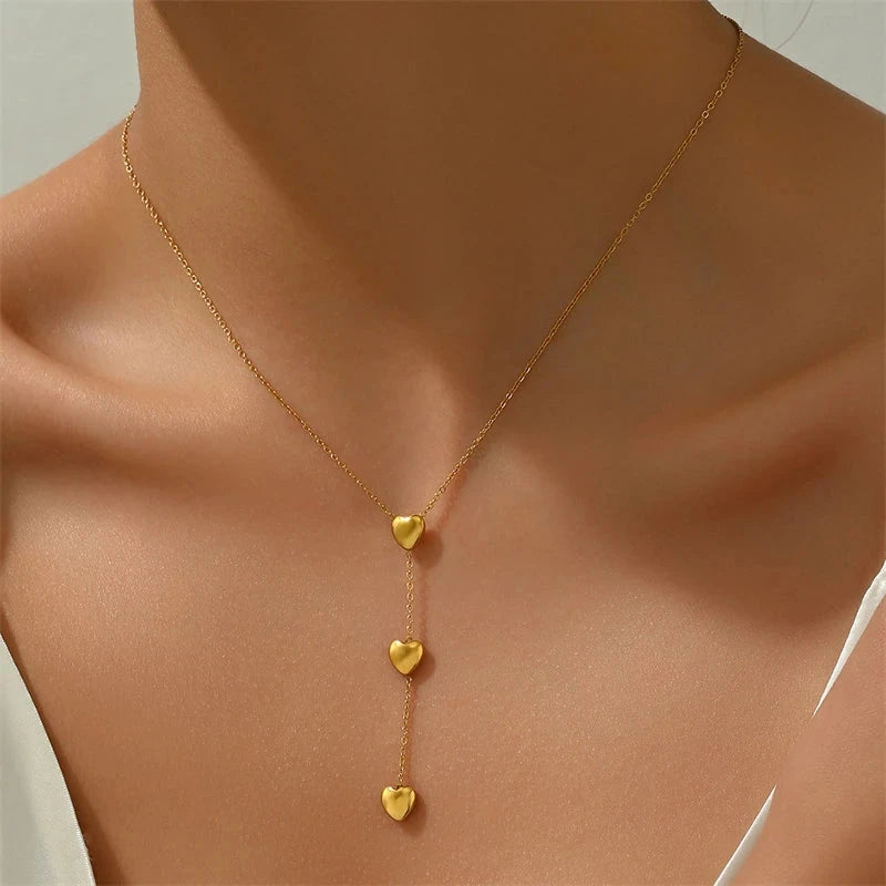 Minimalist Y-shaped ball chain necklace crafted from premium polished stainless steel, featuring a delicate heart drop pendant. Hypoallergenic, water- and tarnish-resistant—perfect for adding modern elegance and effortless charm to any outfit.