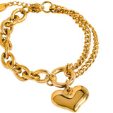 Delicate chain bracelet featuring polished heart-shaped links measuring 0.7 x 0.7 inches, crafted from 18K gold-plated stainless steel. Chain length 6 inches with a 1-inch extender. Non-tarnish, hypoallergenic, lead- and nickel-free, and water-resistant—perfect for adding romantic elegance to any look.