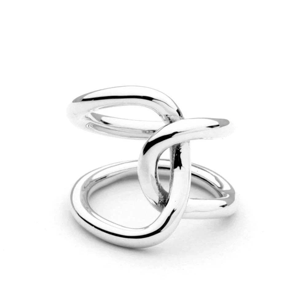 Infinity cross wrap ring crafted from a premium brass base with your choice of 18K gold or silver plating. Lightweight, elegant, and symbolic—representing love and resilience. Hypoallergenic, water- and tarnish-resistant—perfect for adding graceful, modern style to any look.