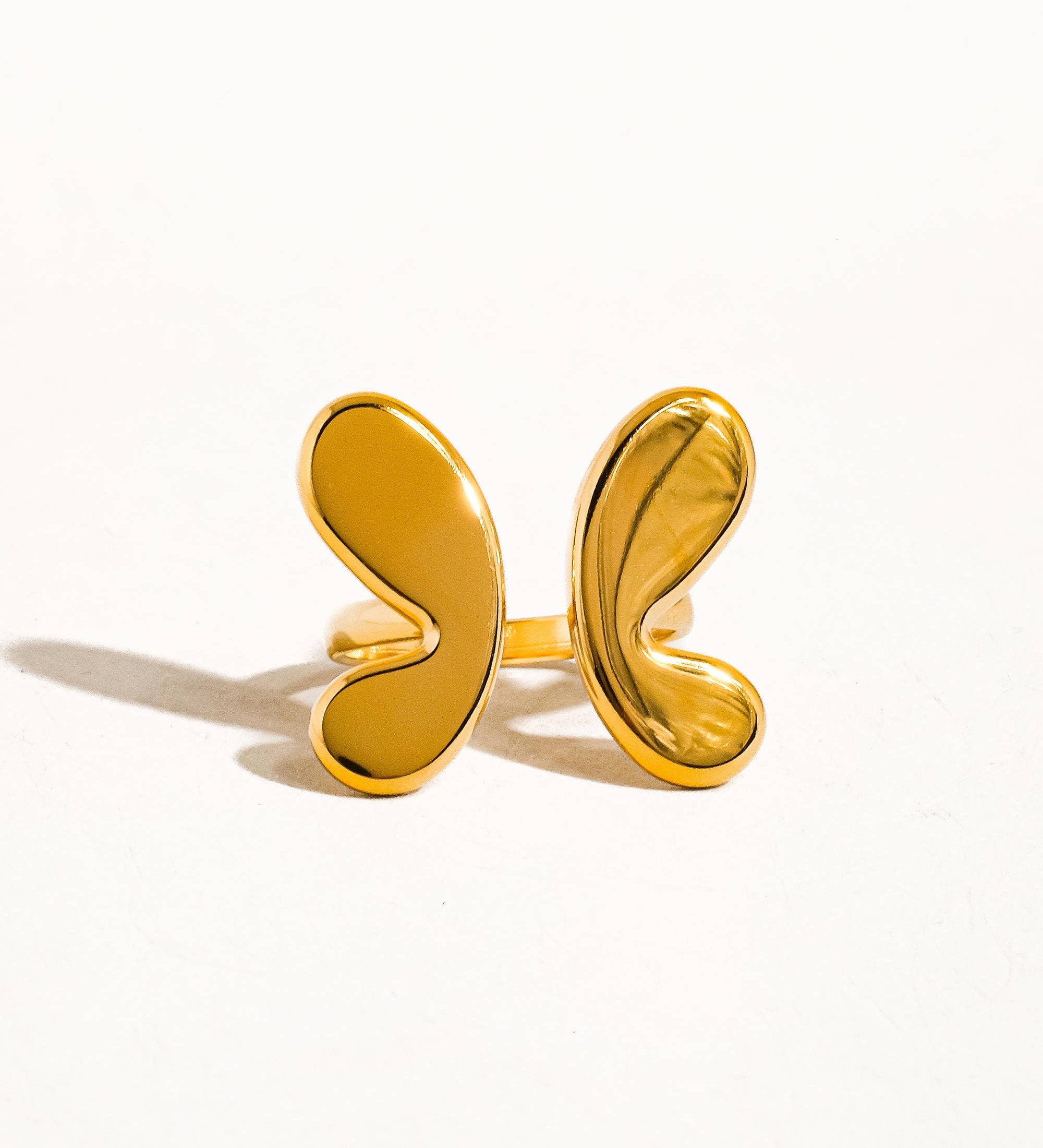 Delicate adjustable ring crafted from premium stainless steel with 18K gold plating, featuring an elegant butterfly motif symbolizing transformation and beauty. Hypoallergenic, water- and tarnish-resistant—perfect for adding playful, meaningful charm to any look.