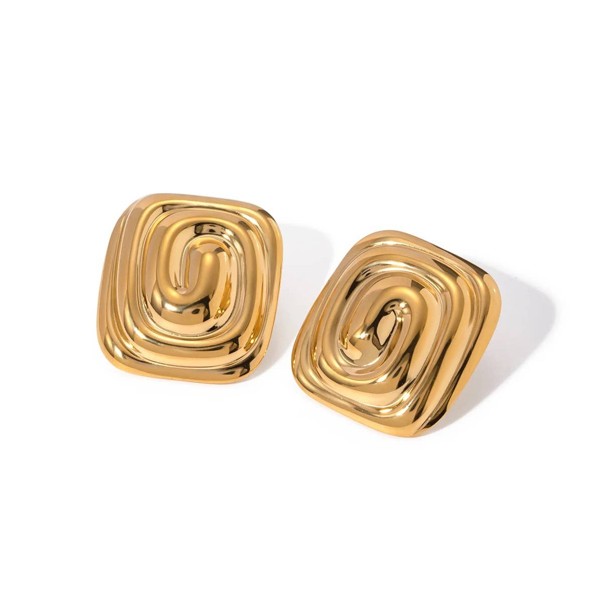 Matilda Swirl Stud Earrings in 18K gold plated stainless steel, featuring a sculptural twisted swirl design with a 1-inch diameter.
