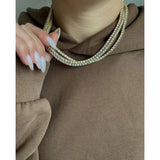 Dainty tennis chain necklace featuring 3mm round-cut AAA cubic zirconia stones, crafted with your choice of gold or rhodium-plated stainless steel. Hypoallergenic, water- and tarnish-resistant—perfect for layering or wearing solo to add timeless sparkle to any look.