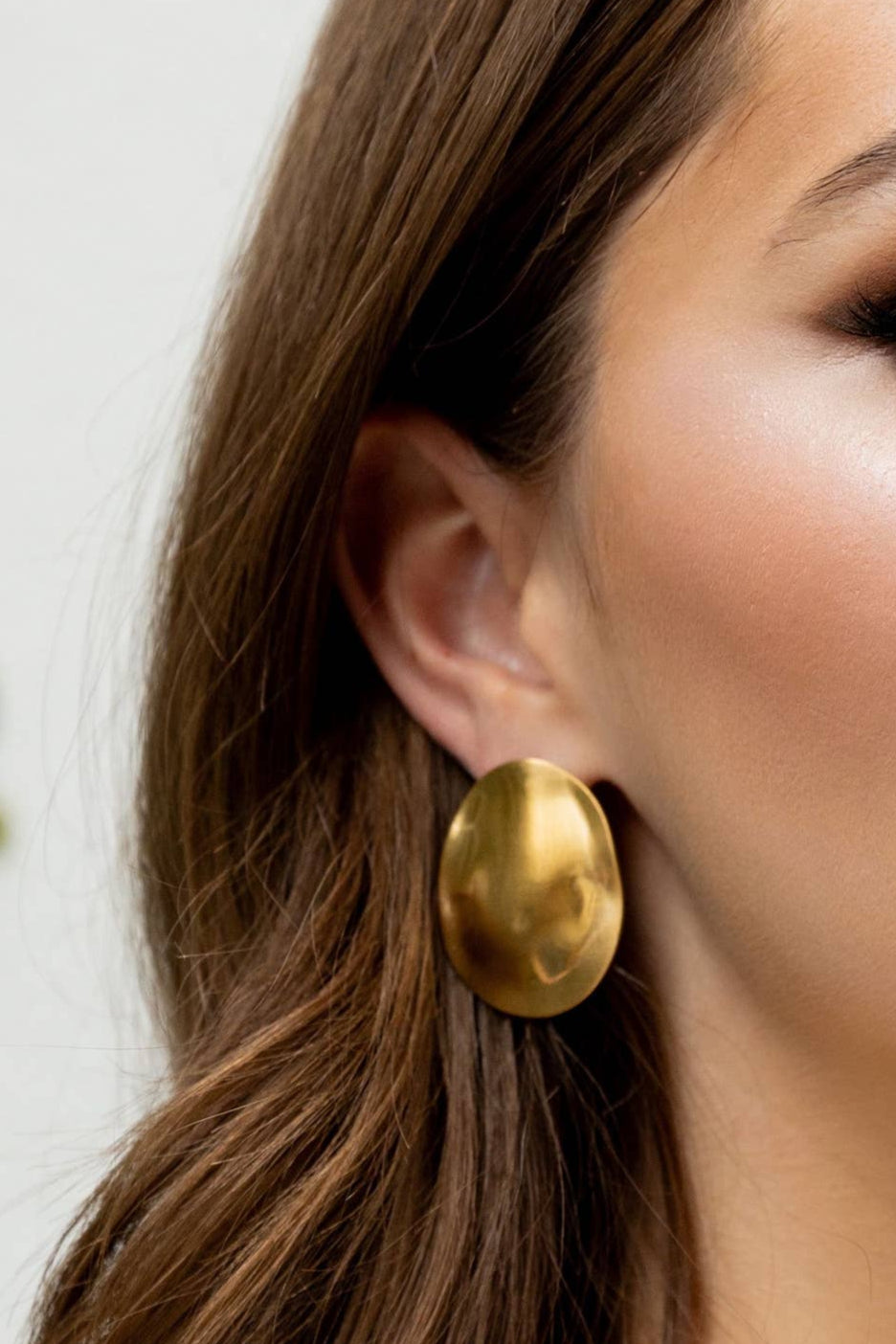 Statement earrings crafted from a sterling silver base with premium 18K gold plating, featuring a bold silhouette designed to turn heads. Hypoallergenic, water- and tarnish-resistant—perfect for adding effortless elegance from brunch to evening events.