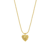 Delicate gold necklace featuring a softly hammered puffy heart pendant for a playful, textured shine. Crafted from 18K gold-plated stainless steel and available in multiple sizes. Hypoallergenic, water- and tarnish-resistant—an effortlessly refined piece perfect for everyday charm or layered styling.