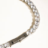 Elegant non-tarnish rhinestone bracelet made from stainless steel, featuring sparkling cubic zirconia stones along a 6-inch chain. Designed to be water-resistant, hypoallergenic, and free from lead and nickel, with a sleek and dressy style perfect for special occasions.