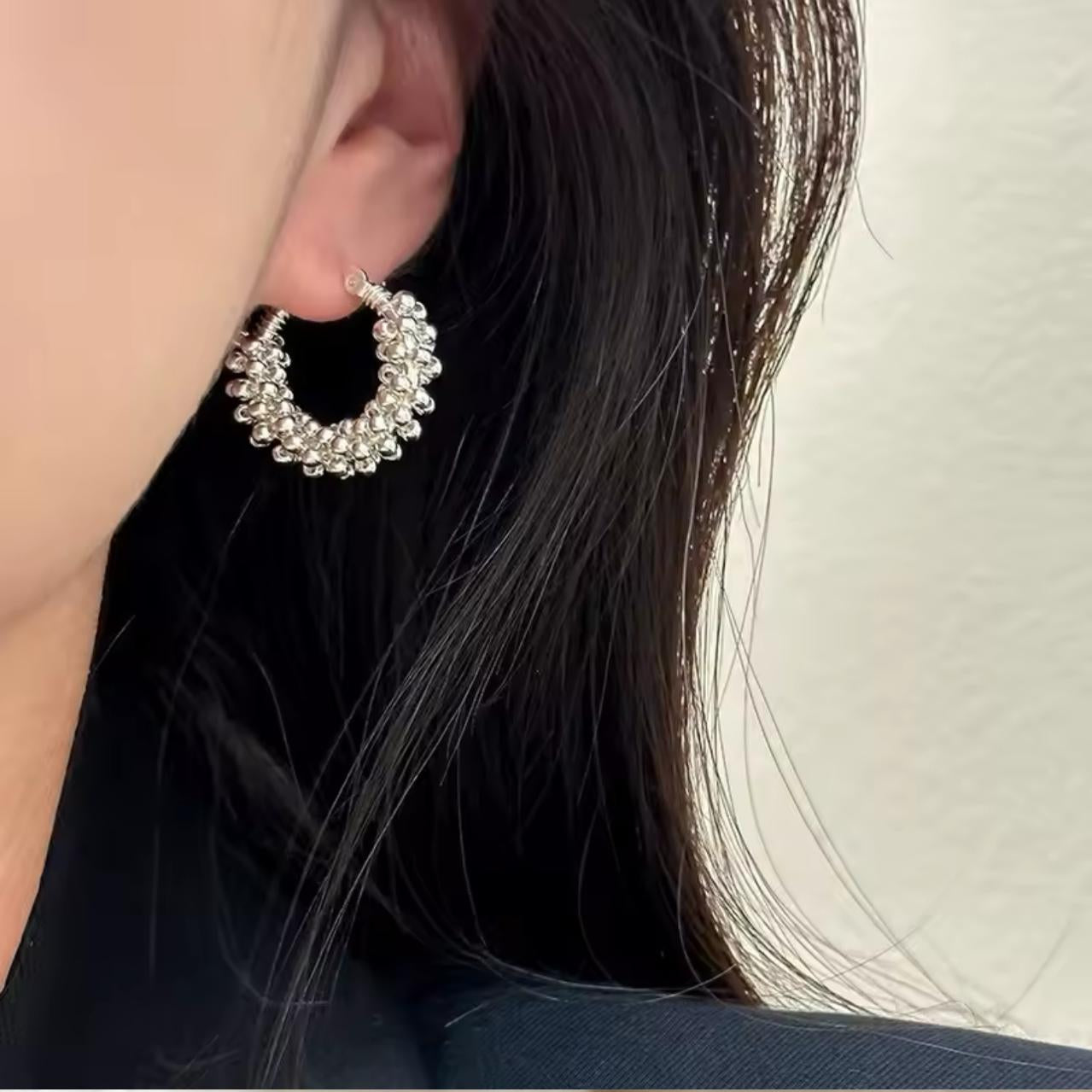 Simple dainty stud earrings crafted from a brass base with sterling silver plating. Hypoallergenic, water- and tarnish-resistant—perfect for everyday sophistication and effortless wear with a secure backing for comfortable all-day use.