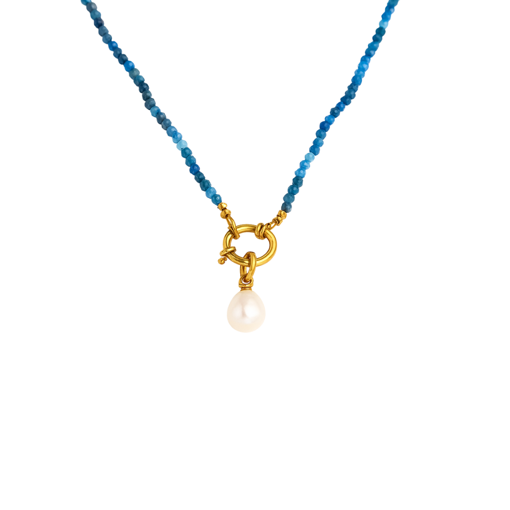 Delicate necklace featuring tiny natural apatite stones paired with a lustrous freshwater pearl charm. Crafted from water-resistant, tarnish-resistant stainless steel with gold plating. Hypoallergenic—perfect for adding natural elegance and effortless sophistication to any jewellery collection.