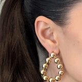 Sleek oval earrings crafted from 18K gold-plated stainless steel, featuring a refined silhouette that balances elegance and versatility. Hypoallergenic, water- and tarnish-resistant—perfect for elevating casual looks or complementing evening attire.
