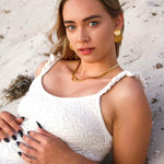 Modern snake chain necklace crafted from 14K gold-plated stainless steel with a radiant finish, featuring a delicate heart pendant symbolising love and elegance. Hypoallergenic, water- and tarnish-resistant—perfect for adding a romantic touch to any look.