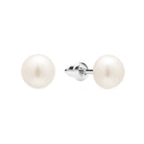 Timeless pearl stud earrings designed for understated elegance, perfect for both everyday wear and special occasions. Featuring luminous faux pearls set in 18K gold-plated stainless steel. Hypoallergenic, water- and tarnish-resistant—a graceful staple you'll reach for time and again.