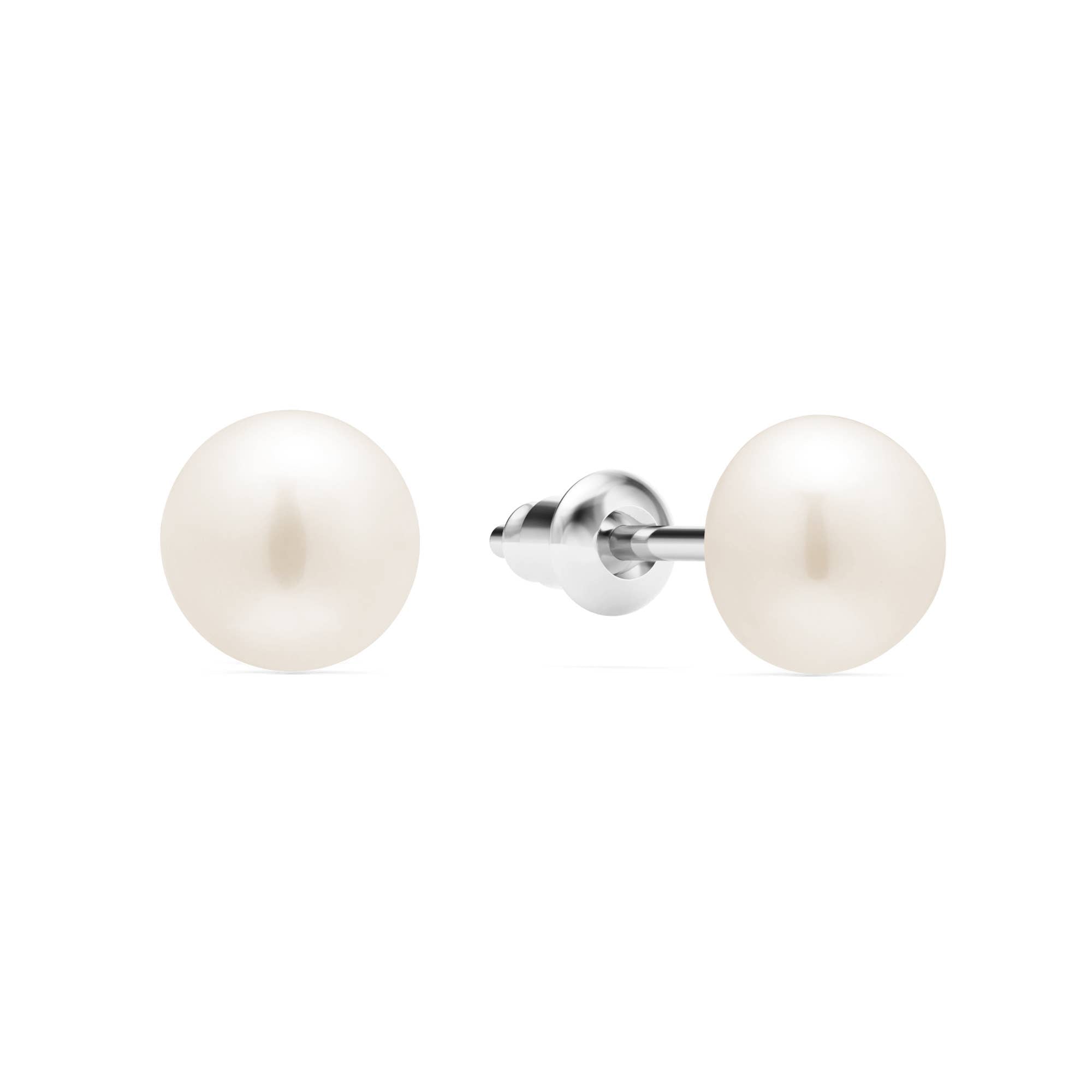 Timeless pearl stud earrings designed for understated elegance, perfect for both everyday wear and special occasions. Featuring luminous faux pearls set in 18K gold-plated stainless steel. Hypoallergenic, water- and tarnish-resistant—a graceful staple you'll reach for time and again.