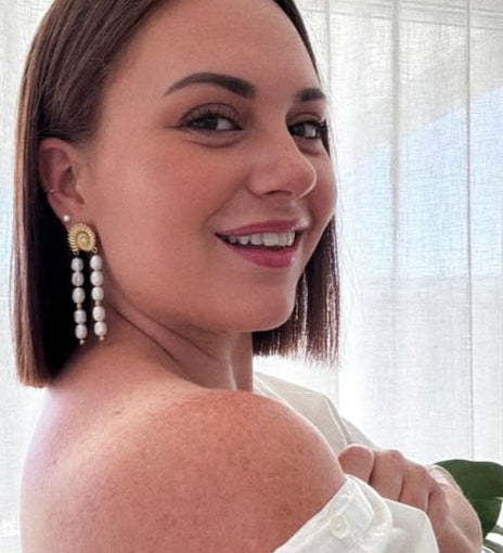 Tassel drop earrings crafted from 18K gold-plated stainless steel, featuring cascading freshwater pearls for classic elegance and ocean-inspired charm. Hypoallergenic, water- and tarnish-resistant—perfect for adding timeless sophistication to any outfit.