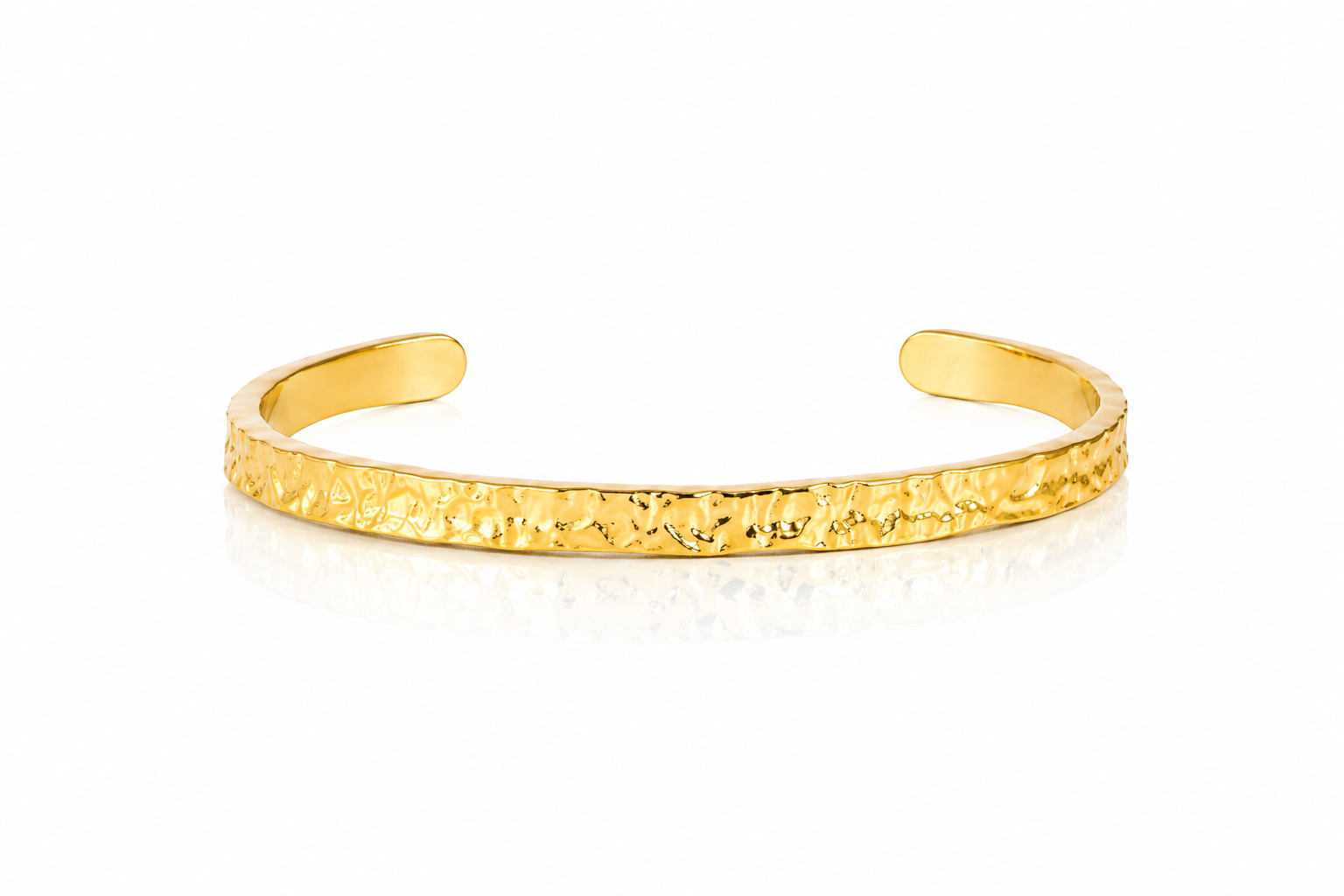 Gold bracelet on a white background