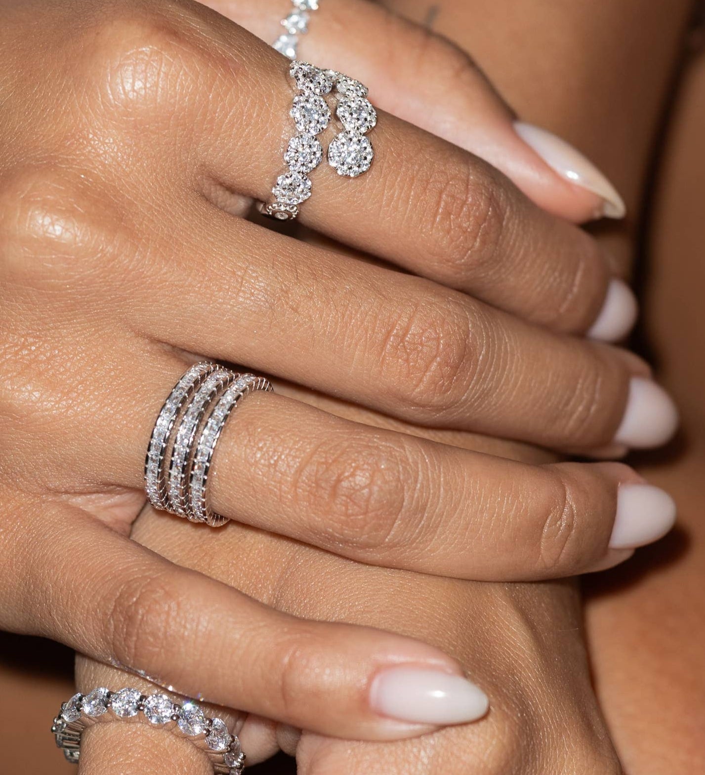 Set of three delicate stackable rings available in sterling silver or gold-plated finish, each accented with cubic zirconia for subtle sparkle. Lightweight, minimalist, and tarnish-resistant—perfect for wearing solo or stacked to add effortless charm to any look.