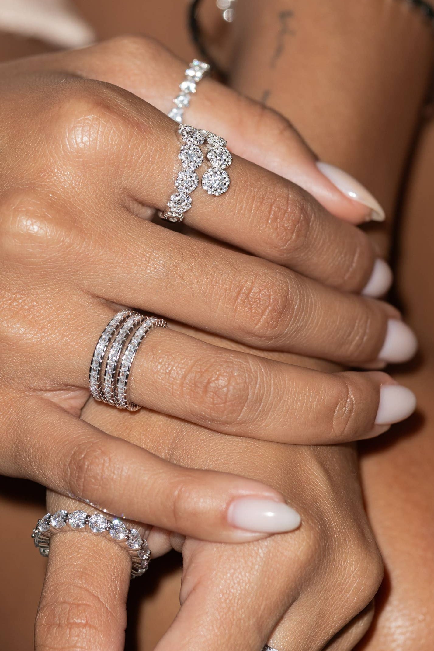 Set of three delicate stackable rings available in sterling silver or gold-plated finish, each accented with cubic zirconia for subtle sparkle. Lightweight, minimalist, and tarnish-resistant—perfect for wearing solo or stacked to add effortless charm to any look.
