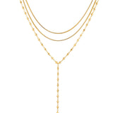Three-in-one layered necklace featuring mixed textures and an adjustable fit for effortless styling. Crafted from 18K gold-plated stainless steel, this hypoallergenic, water- and tarnish-resistant piece offers a polished, stacked look in a single easy-to-wear design—perfect for elevating everyday outfits.