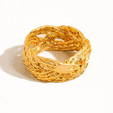Sculptural vintage-inspired ring with a polished gold twist design, crafted from 18K gold-plated brass. Sized at US 7 (0.682" diameter), this hypoallergenic, water- and tarnish-resistant piece blends timeless charm with everyday wearability.