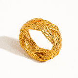 Sculptural vintage-inspired ring with a polished gold twist design, crafted from 18K gold-plated brass. Sized at US 7 (0.682" diameter), this hypoallergenic, water- and tarnish-resistant piece blends timeless charm with everyday wearability.