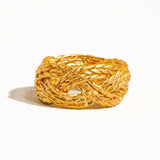 Sculptural vintage-inspired ring with a polished gold twist design, crafted from 18K gold-plated brass. Sized at US 7 (0.682" diameter), this hypoallergenic, water- and tarnish-resistant piece blends timeless charm with everyday wearability.