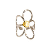 Sculptural floral ring featuring wide silver petals wrapped in radiant gold, creating a dimensional, nature-inspired design. Crafted from 18K gold and silver plated stainless steel in US size 7 (0.682" diameter). Hypoallergenic, water- and tarnish-resistant—an elegant blend of artistry and everyday wear.