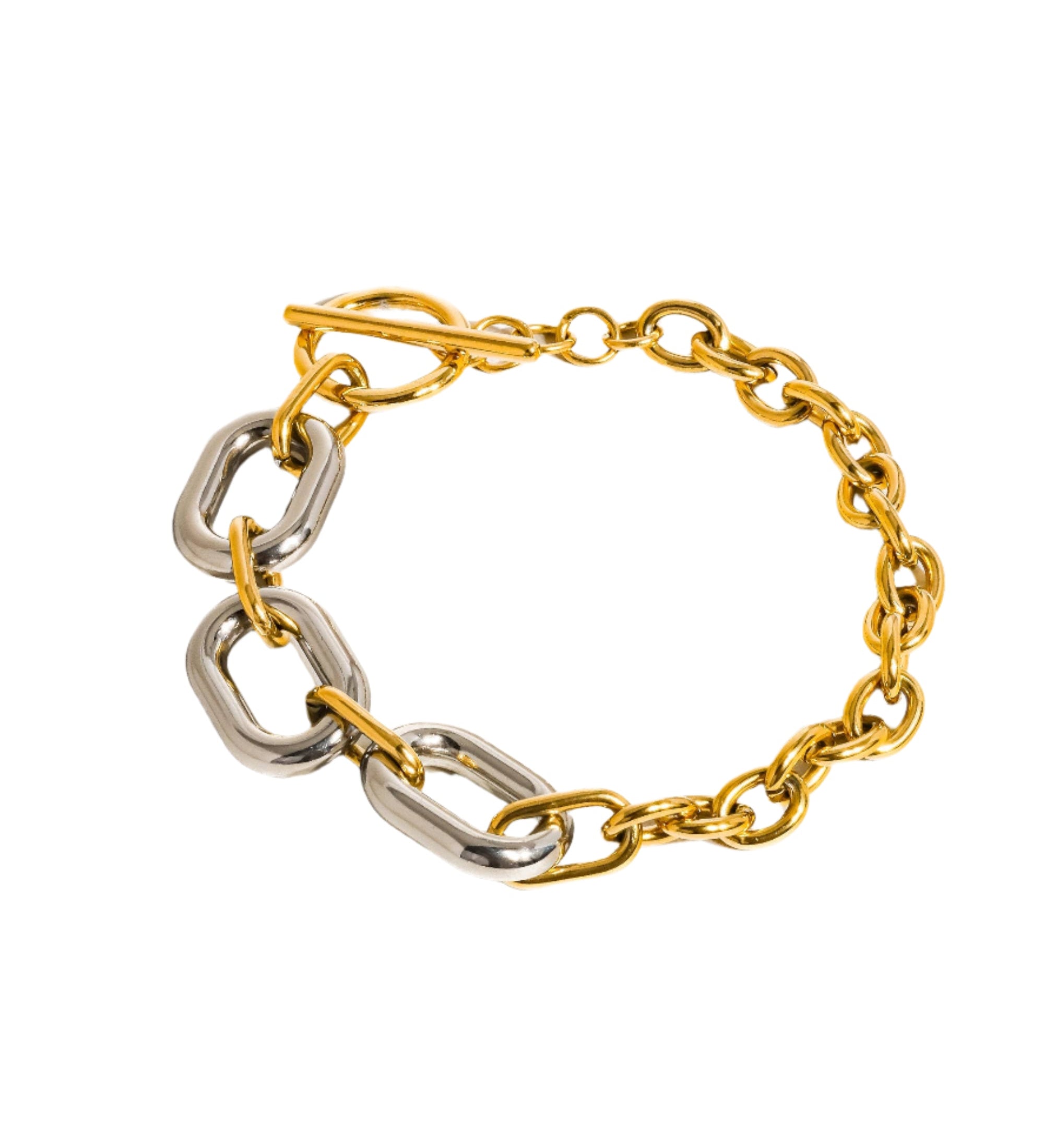 Bold multi-chain bracelet with a polished two-tone gold and silver finish, crafted from 18K plated stainless steel. Measures 8.07 inches in length. Hypoallergenic, water- and tarnish-resistant—a striking layered piece worn solo or stacked.
