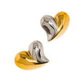 Sculptural heart-shaped stud earrings in a polished two-tone gold and silver finish. Crafted from 18K gold-plated stainless steel, measuring 1 x 0.9 inches. Hypoallergenic, water- and tarnish-resistant—bold romantic accents, perfect for everyday wear or special moments.