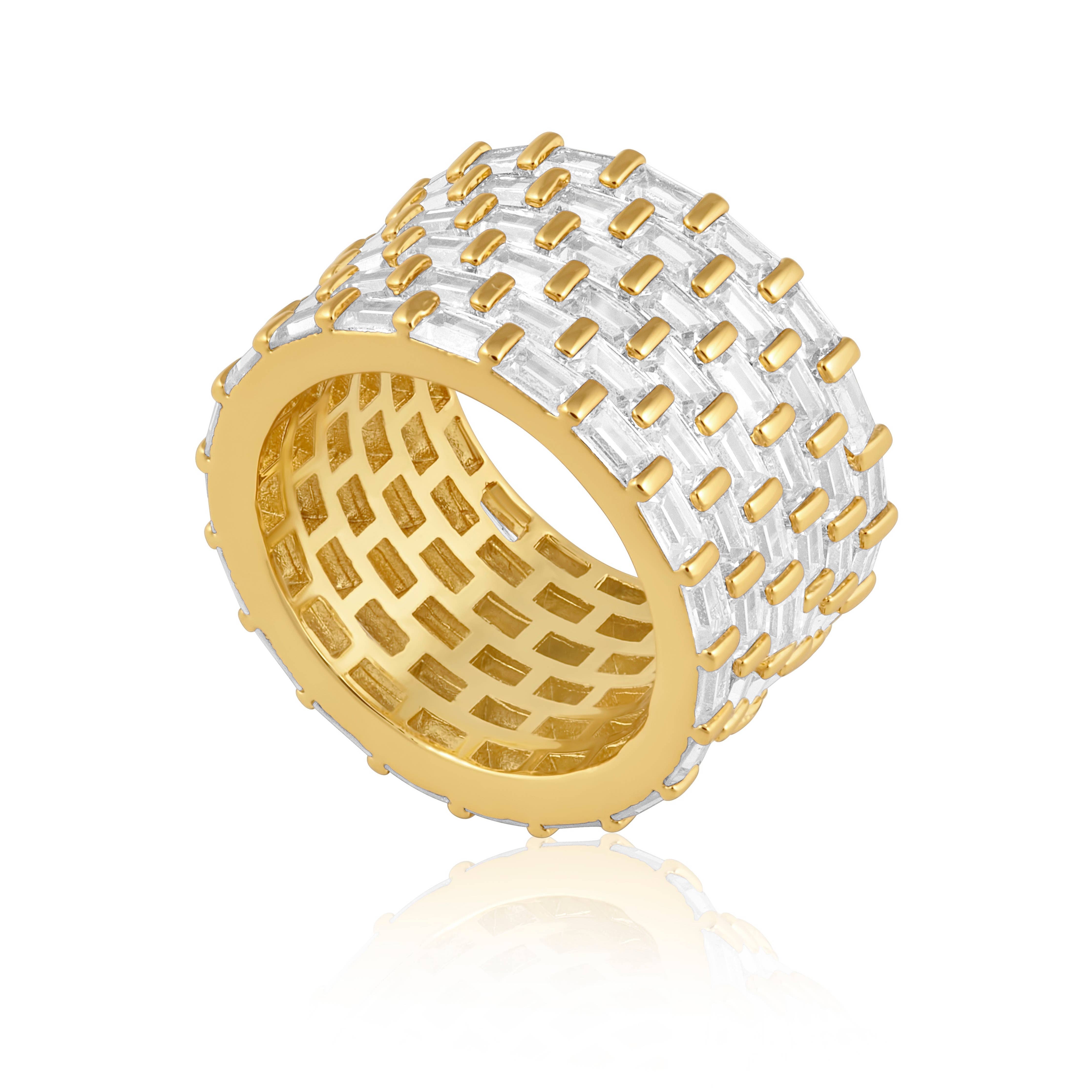 Gold and silver woven ring on a white background