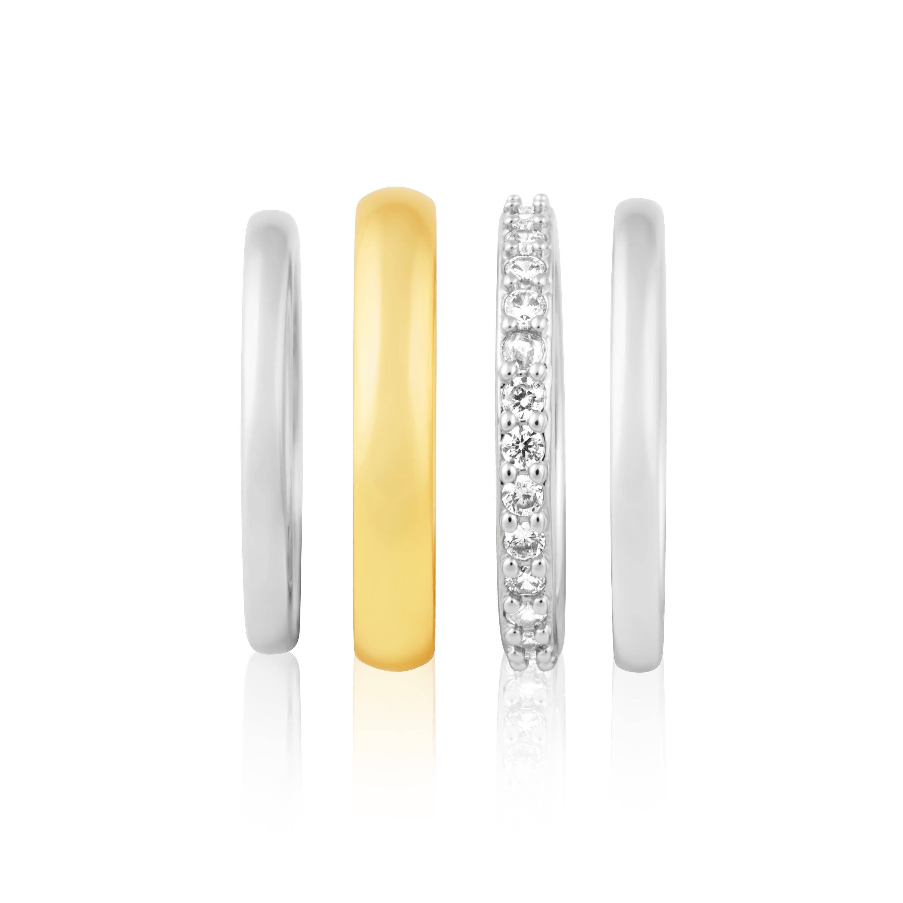 Modern ring set featuring two stackable bands in 18K gold and silver tone plating over stainless steel. Designed for versatile styling—wear together for bold contrast or separately for minimalist flair. Hypoallergenic, water- and tarnish-resistant—an effortlessly chic everyday essential.